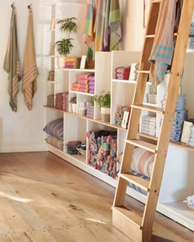 The interior of the Mungo Flagship Store at Old Nick Village displaying a ladder