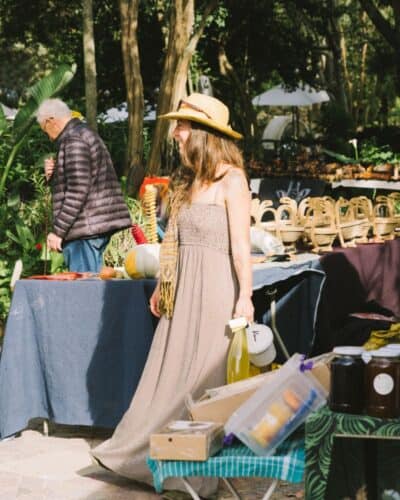 Lady browsing Wednesday Market in Plettenberg Bay